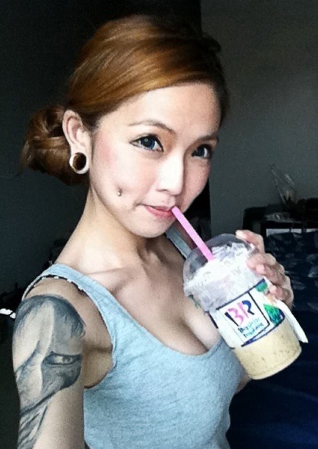 点击大图看下一张：纹身个性小美女套图图7