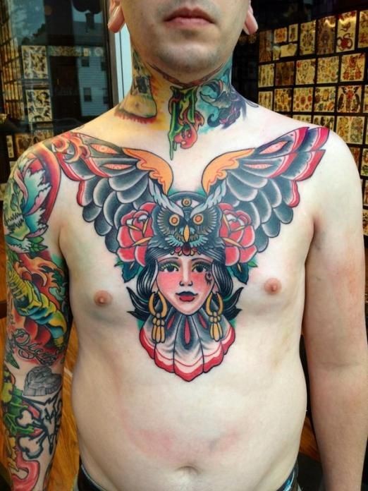 点击大图看下一张：男士胸部非常有个性的纹身图案图3