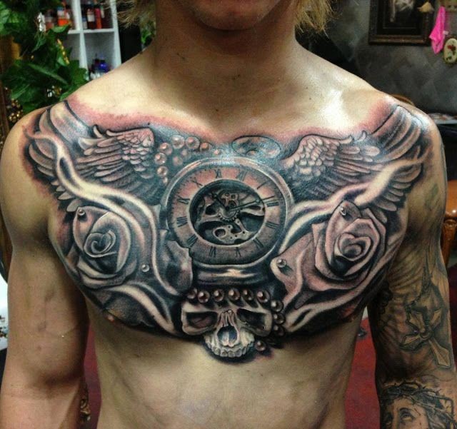 点击大图看下一张：男士胸部个性时尚的纹身图案