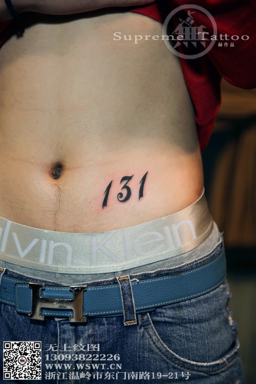 点击大图看下一张：男生腹部日期数字纹身