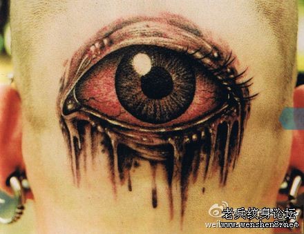点击大图看下一张：头部纹身图片：头部眼睛纹身图片纹身作品