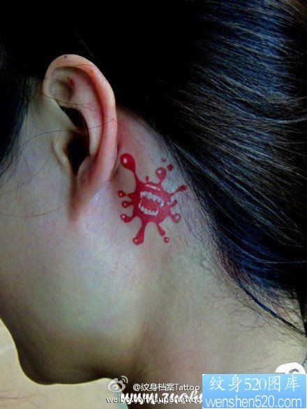 点击大图看下一张：女人耳部水滴牙印纹身图片