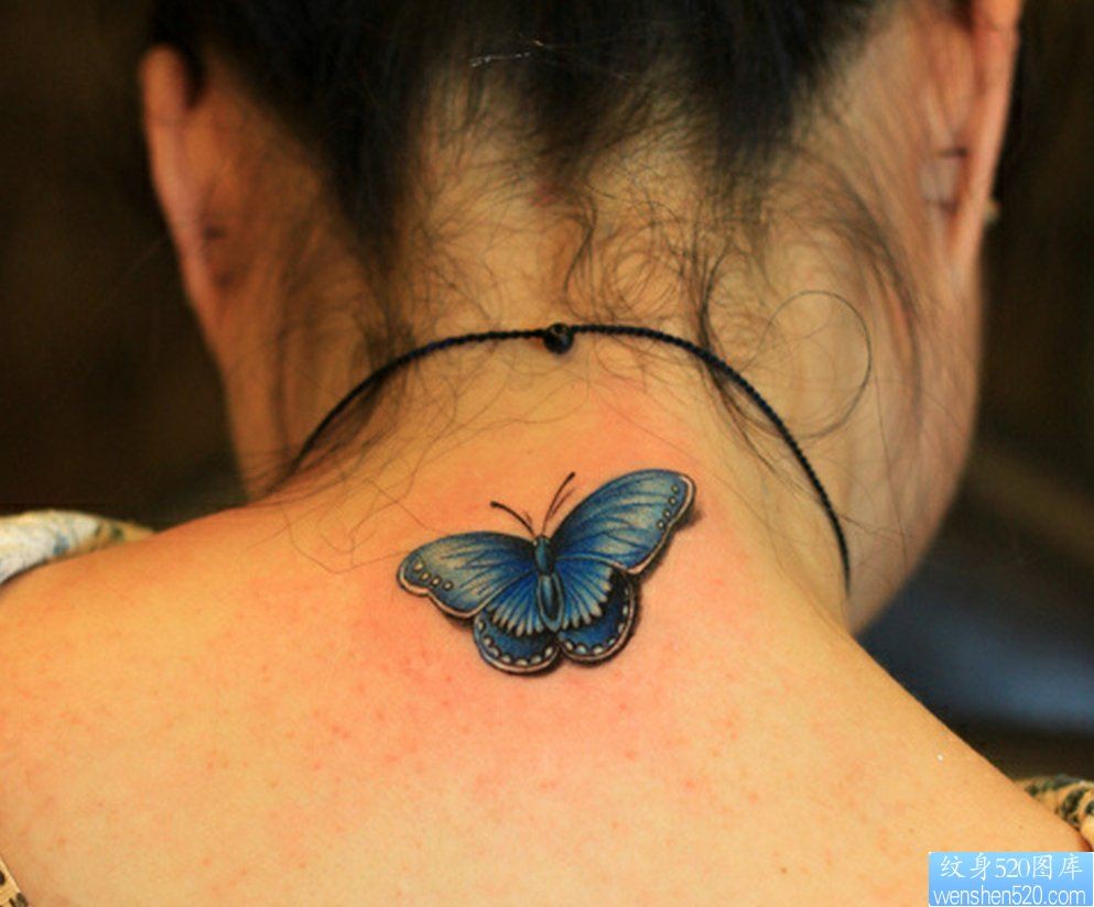 点击大图看下一张：一幅颈部蝴蝶纹身图片由纹身520图库推荐