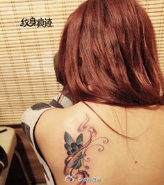 点击大图看下一张：优雅女孩肩部梦幻蝴蝶纹身图