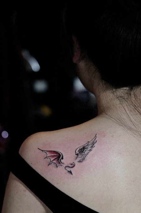 点击大图看下一张：恶魔天使翅膀肩部纹身图案