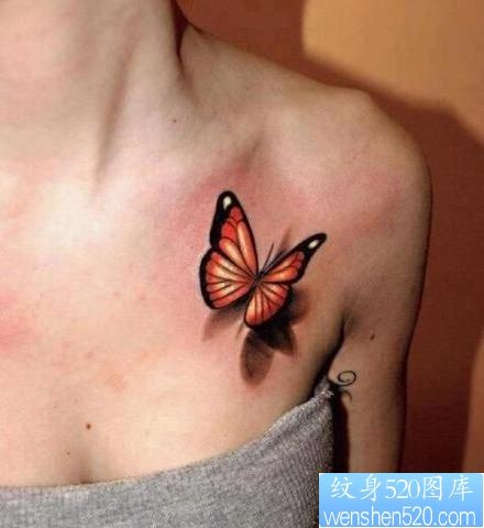 点击大图看下一张：女人胸部精美的彩色蝴蝶纹身图片