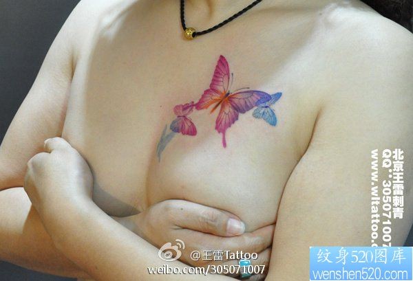 点击大图看下一张：美女胸部漂亮的蝴蝶纹身图片
