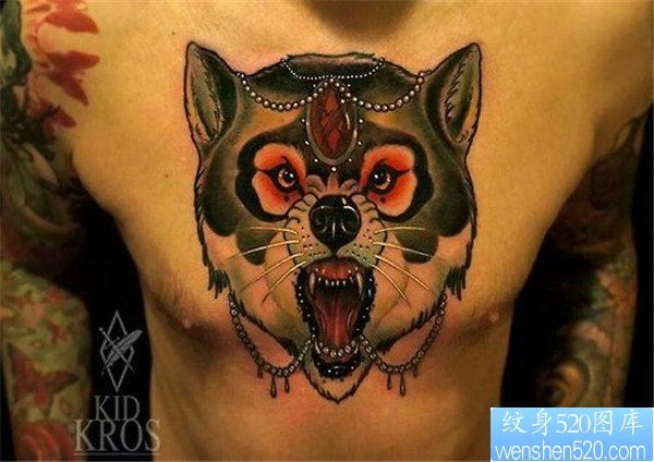 点击大图看下一张：胸部狗头纹身图案
