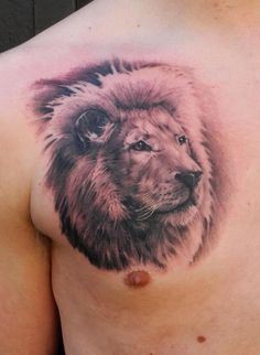 点击大图看下一张：胸部帅气的狮子头纹身图2