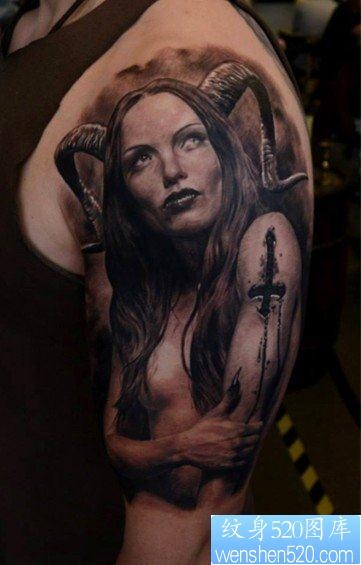 点击大图看下一张：为大家一张大臂上的欧美女性物纹身作品