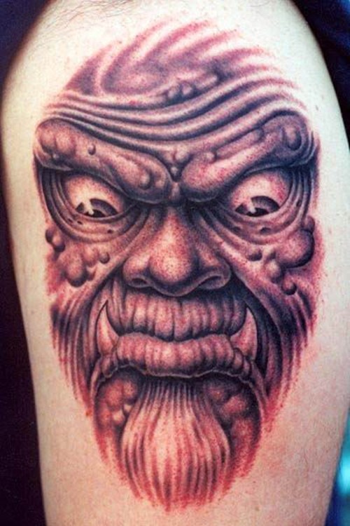 点击大图看下一张:时尚个性鬼面纹身图3