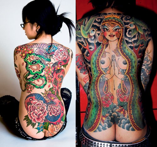点击大图看下一张：女士背部霸气的日式纹身图案