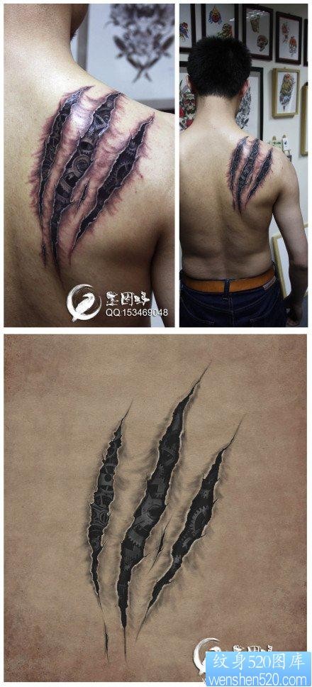 点击大图看下一张：男生后背霸气超酷的撕皮与机械纹身图片
