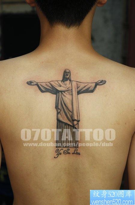 点击大图看下一张：后背上一幅耶稣纹身图片