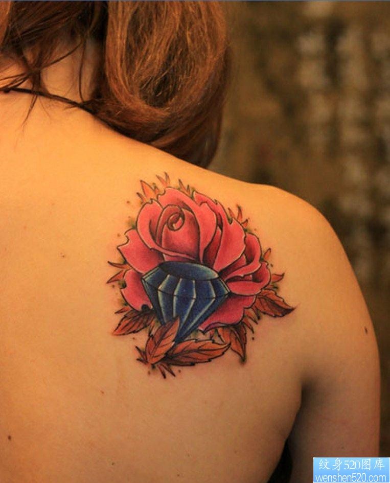 点击大图看下一张：纹身520图库推荐一幅背部玫瑰花钻石纹身图片