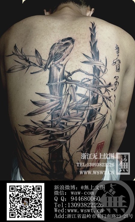 点击大图看下一张：背部竹子鸟纹身