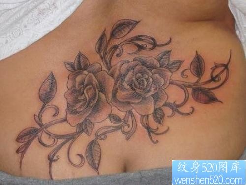 点击大图看下一张：腰部玫瑰花纹身图片作品