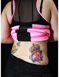 美女腰部漂亮潮流的罂粟花纹身图片