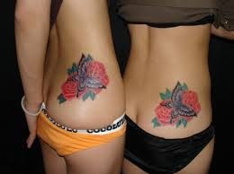 点击大图看下一张：情侣腰部蝴蝶玫瑰纹身