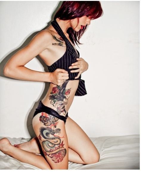点击大图看下一张：女性腰部漂亮性感的纹身图案图2