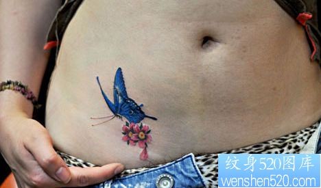 点击大图看下一张：女孩子腹部彩色蝴蝶樱花纹身图片