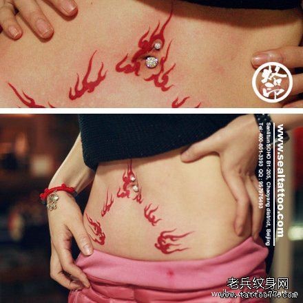 点击大图看下一张：美女腹部潮流好看的火焰纹身图片