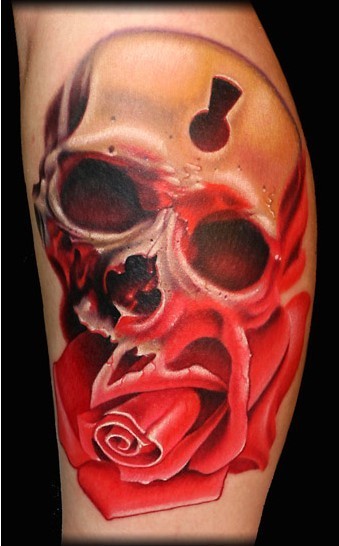 点击大图看下一张：女士手臂血红恐怖骷髅图案纹身