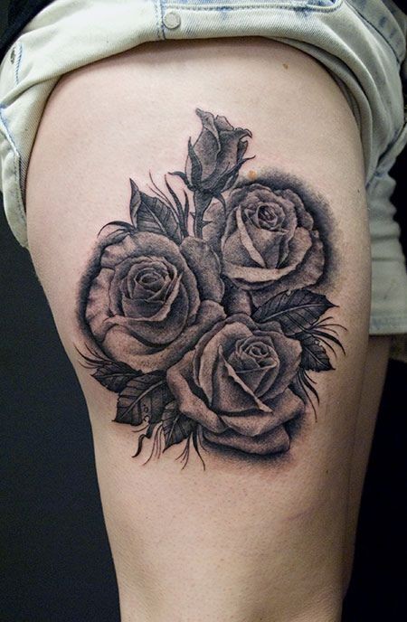 点击大图看下一张：大腿部漂亮的玫瑰纹身