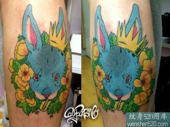 点击大图看下一张：腿后部的蓝色兔子纹身图片