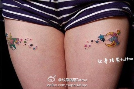 点击大图看下一张：美女腿部潮流好看的五角星纹身图片