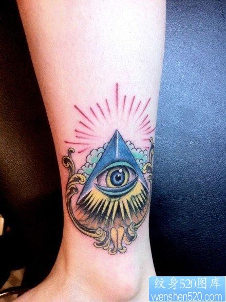 点击大图看下一张:女人腿部漂亮潮流的智慧之眼纹身图片