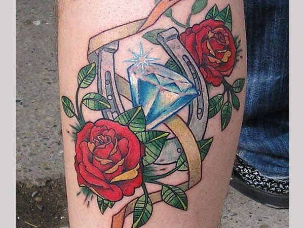 点击大图看下一张：纹身520图库推荐一款钻石和玫瑰的纹身