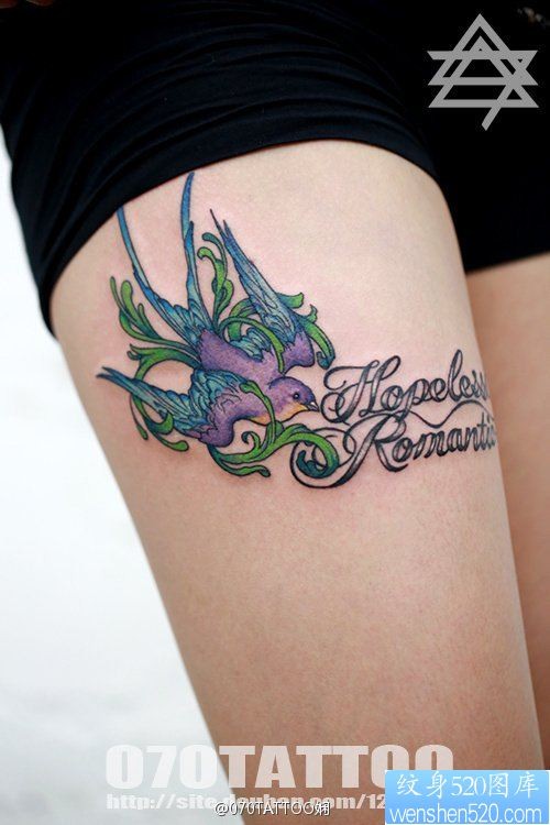 点击大图看下一张：美女人感大腿上的一幅燕子纹身作品