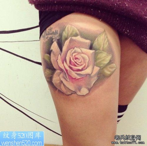 点击大图看下一张：一幅女人腿部玫瑰花纹身作品