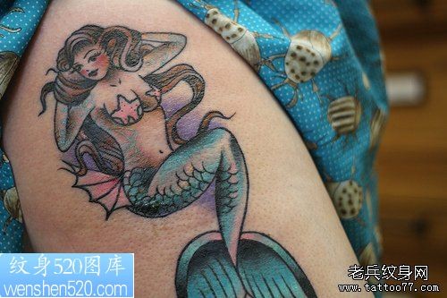 点击大图看下一张：腿部彩色美人鱼纹身作品