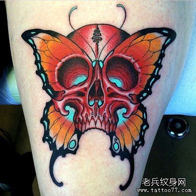 点击大图看下一张：一款腿部蝴蝶骷髅纹身图案