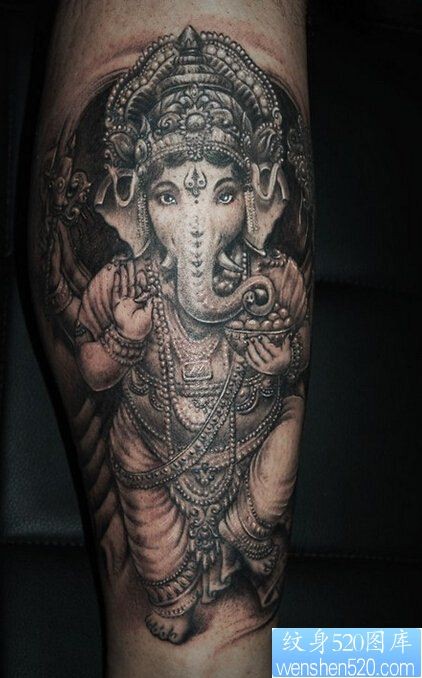 点击大图看下一张：一款腿部宗教象神纹身图案