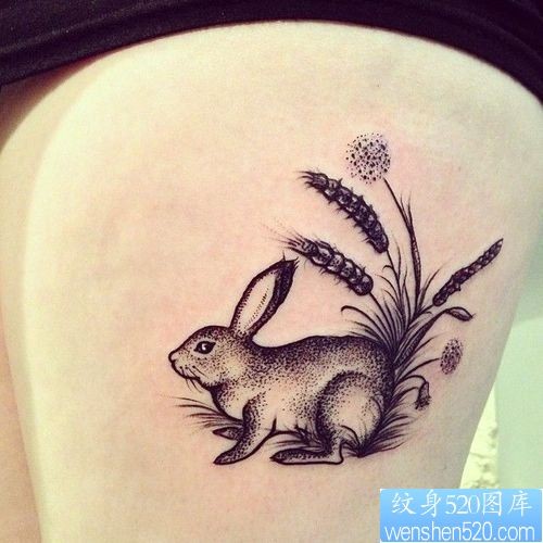 点击大图看下一张：女性腿部点刺兔子纹身图案