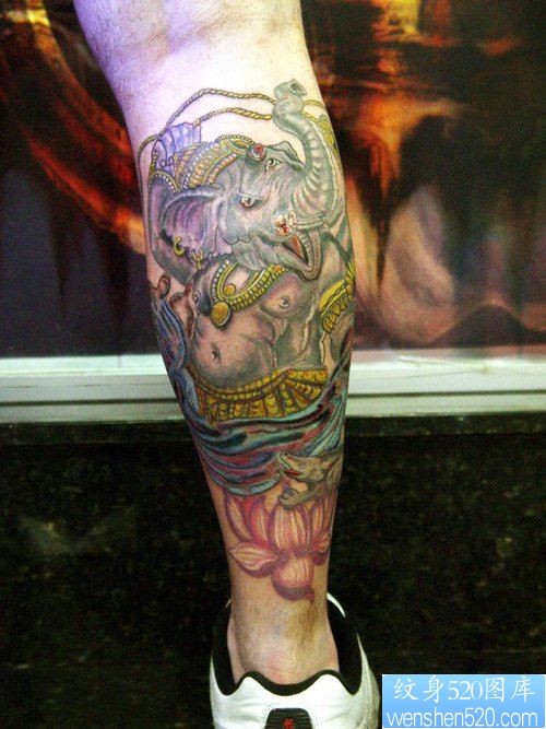 点击大图看下一张：纹身馆推荐一款腿部宗教彩色象神纹身图案