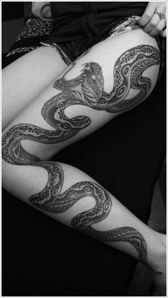 点击大图看下一张：女性腿部超级有个性的蛇纹身图2