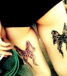 点击大图看下一张：腿部漂亮唯美的蝴蝶结纹身