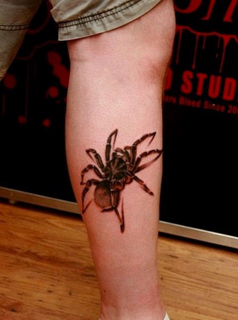 点击大图看下一张：潮人的爱好  腿部蜘蛛纹身图3