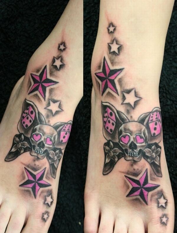 点击大图看下一张：脚背上漂亮的骷髅蝴蝶结纹身