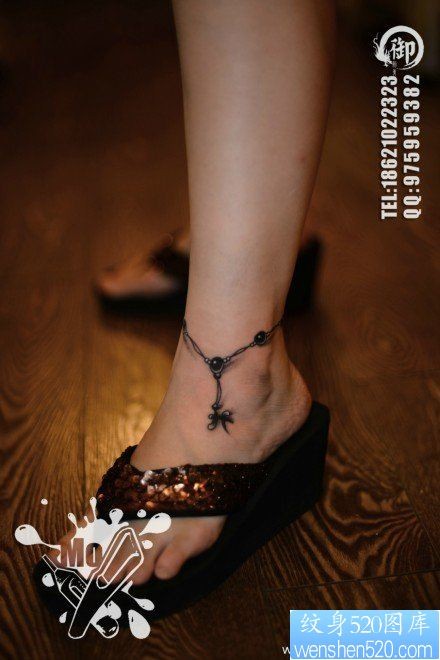点击大图看下一张：一幅女人脚腕时尚小巧的脚链纹身图片