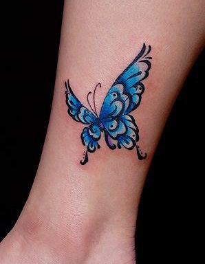 点击大图看下一张：蓝色蝴蝶纹身图案图案