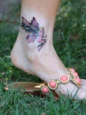 点击大图看下一张：美女脚踝纹身图案，小天使纹身图案图案