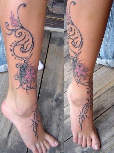 点击大图看下一张：女孩子腿部花藤纹身