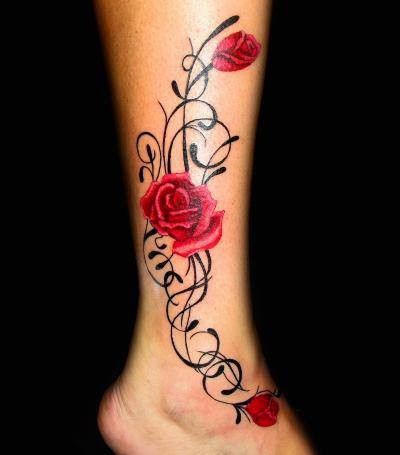 点击大图看下一张：小腿到脚踝处漂亮的玫瑰纹身