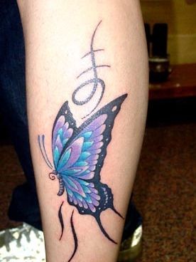 点击大图看下一张：小腿部漂亮的蝴蝶纹身