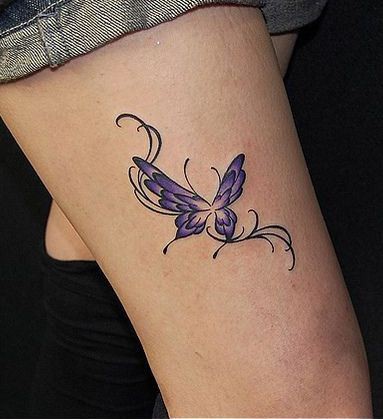 点击大图看下一张：小腿上的小蝴蝶纹身